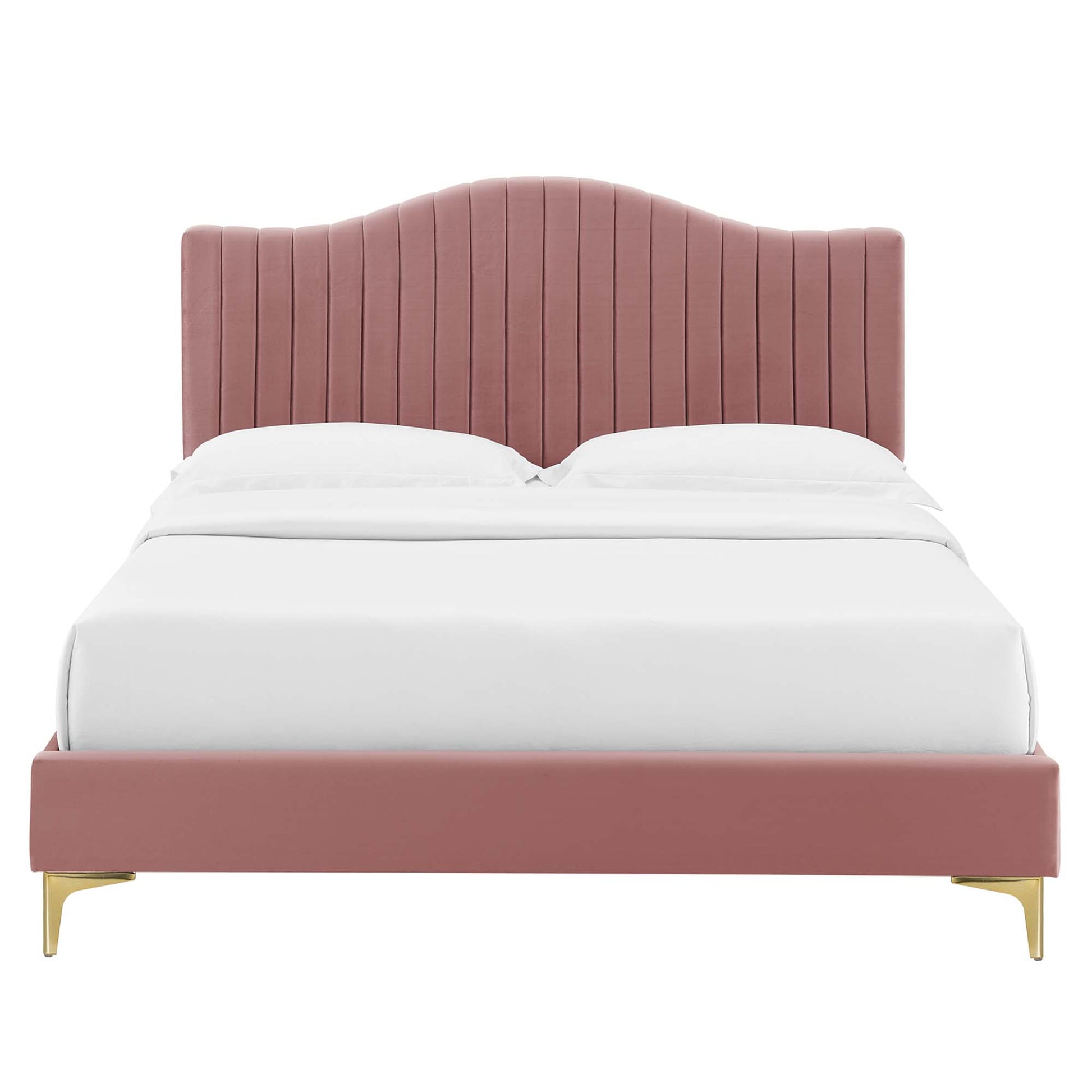 Pink velvet bed with vertical channel-tufted curved headboard, low footboard and gold legs, white bedding.