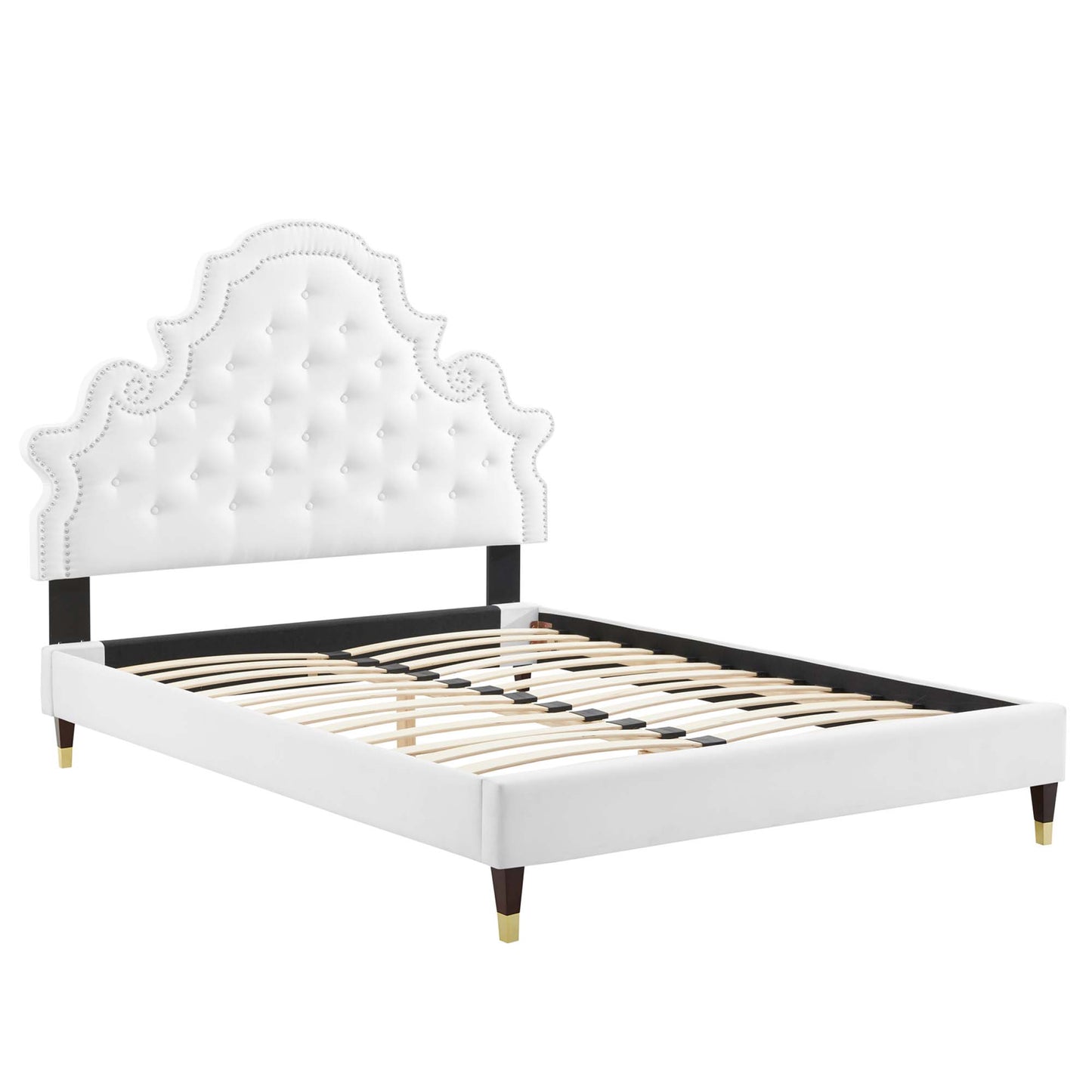 White tufted upholstered full platform bed with an ornate arched headboard, black rails, slat base, and gold-tipped legs