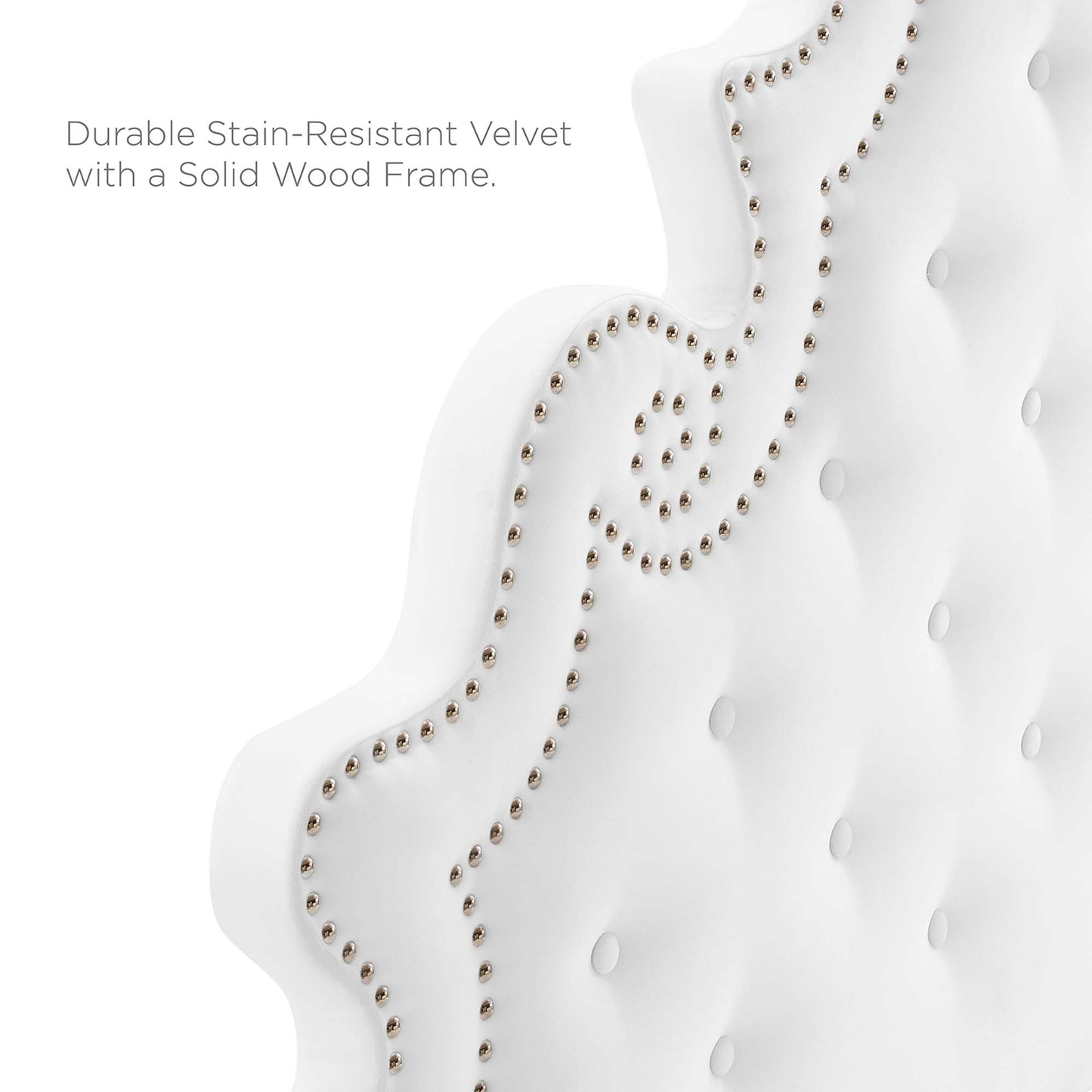 White tufted performance velvet full platform bed with nailhead trim and solid wood frame.