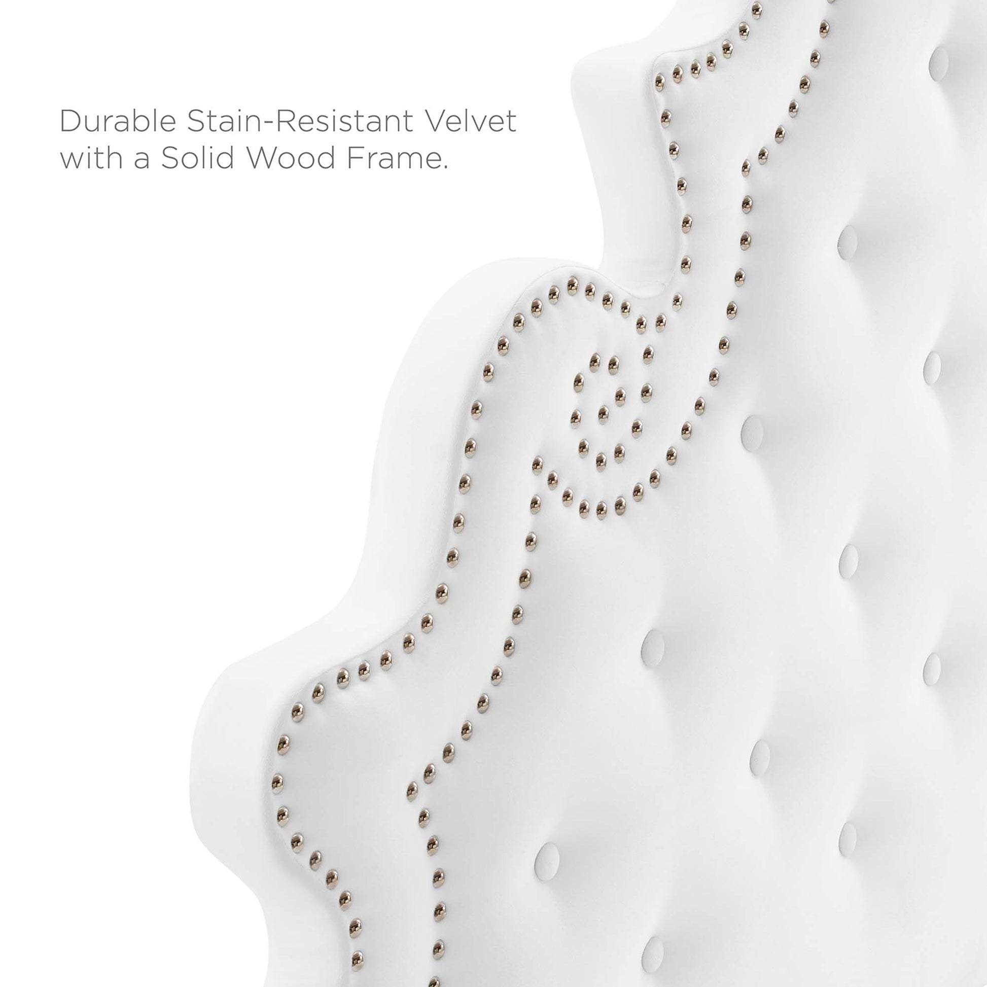 White tufted performance velvet full platform bed with nailhead trim and solid wood frame.