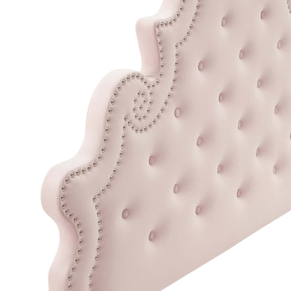 Pink tufted full-platform bed with curved scalloped headboard & silver nailhead trim.