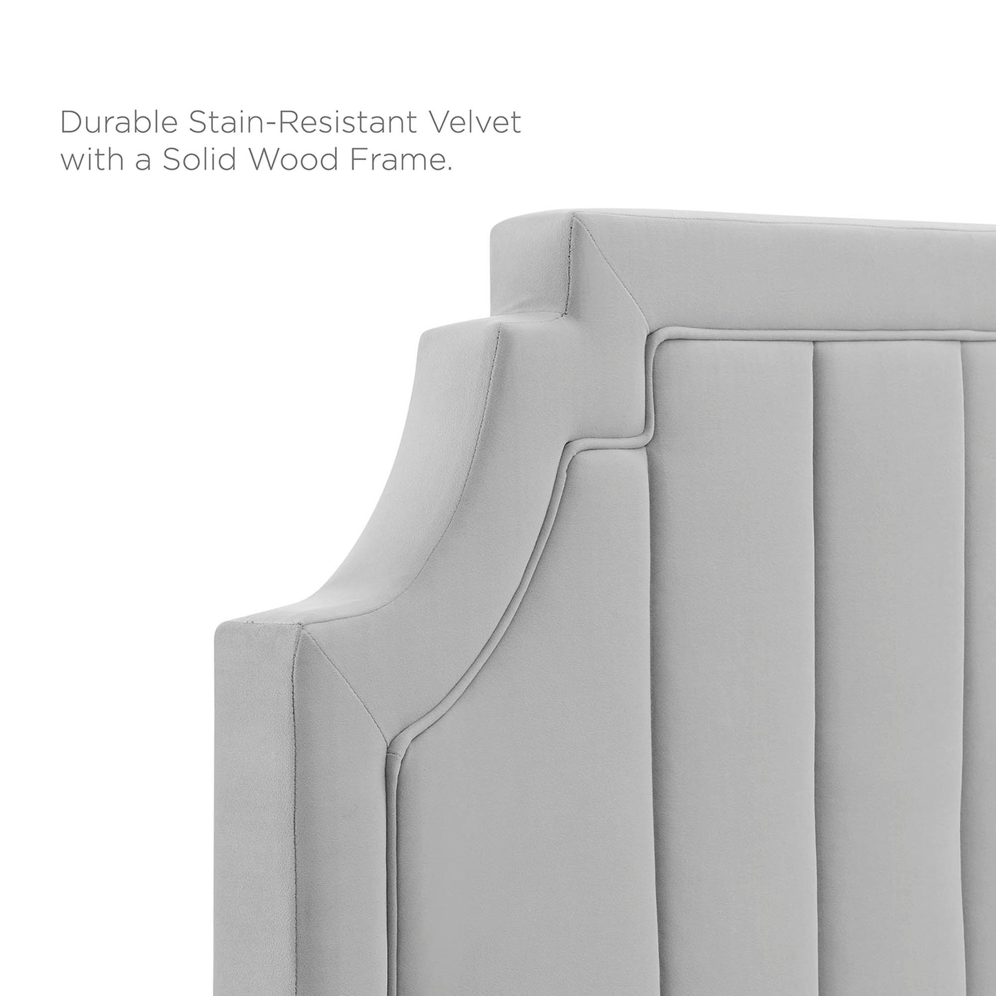 Light gray velvet twin platform bed with upholstered vertical-channel headboard and solid wood frame; modern bedroom.