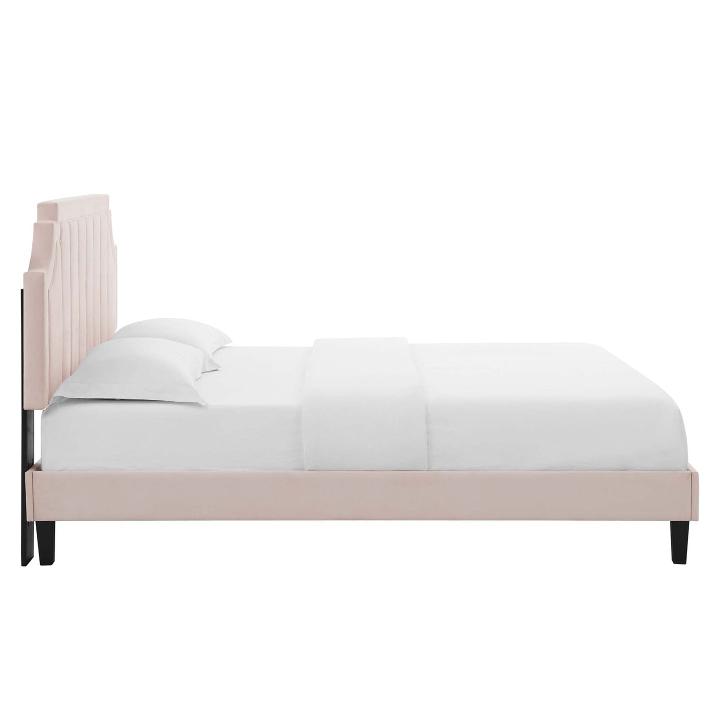 Red upholstered twin platform bed with a tall vertical-panel headboard, black tapered legs, and white bedding.