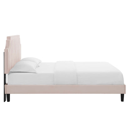 Red upholstered twin platform bed with a tall vertical-panel headboard, black tapered legs, and white bedding.