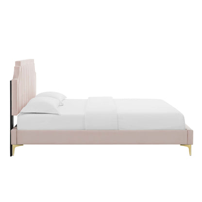 Red velvet full platform bed with tall vertical-panel tufted headboard and gold legs, dressed in white linens.