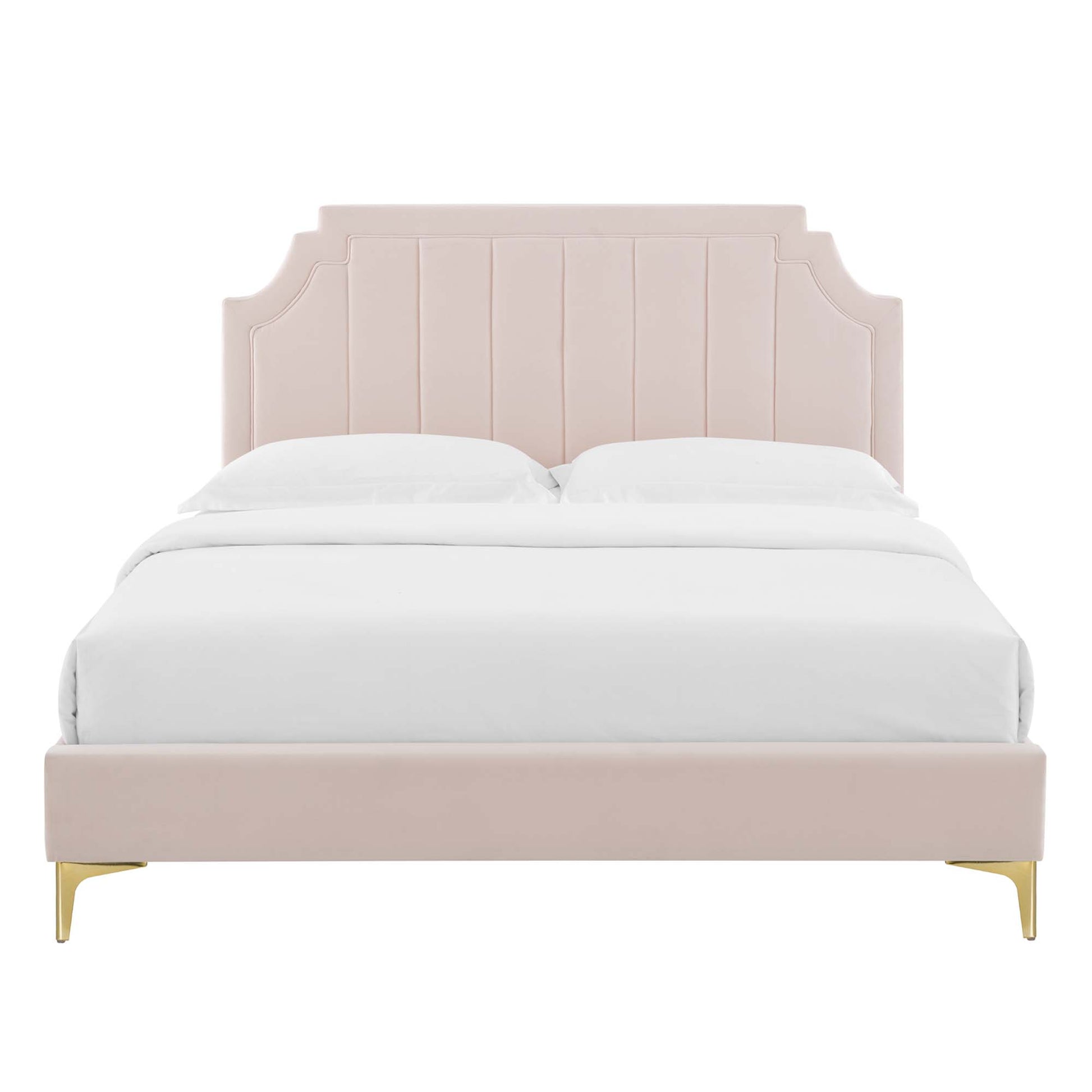 Red upholstered bed with tall, channel-tufted headboard, curved side corners, matching footboard, gold legs, white bedding.