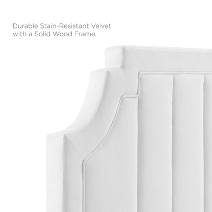 White velvet upholstery on a king platform bed with a solid-wood frame.