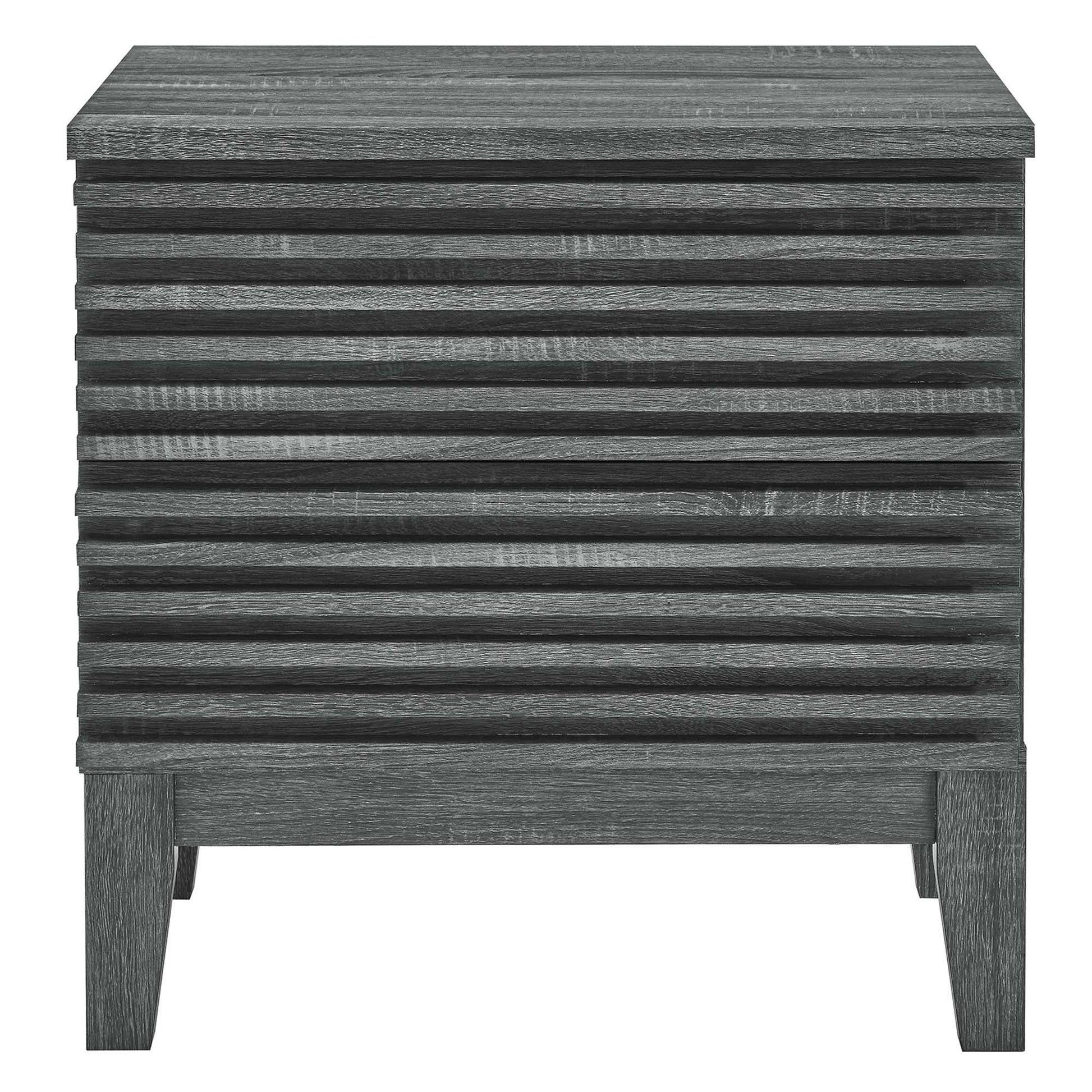 Charcoal gray wood nightstand with horizontal slatted drawer front and sturdy block legs, modern rustic style.