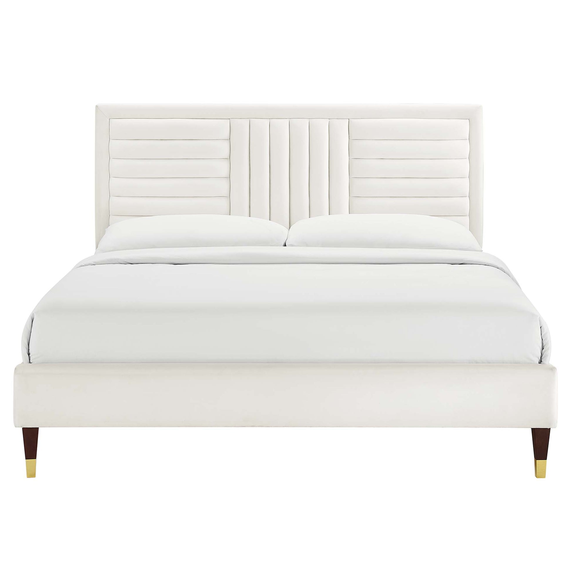 White velvet channel-tufted queen platform bed.