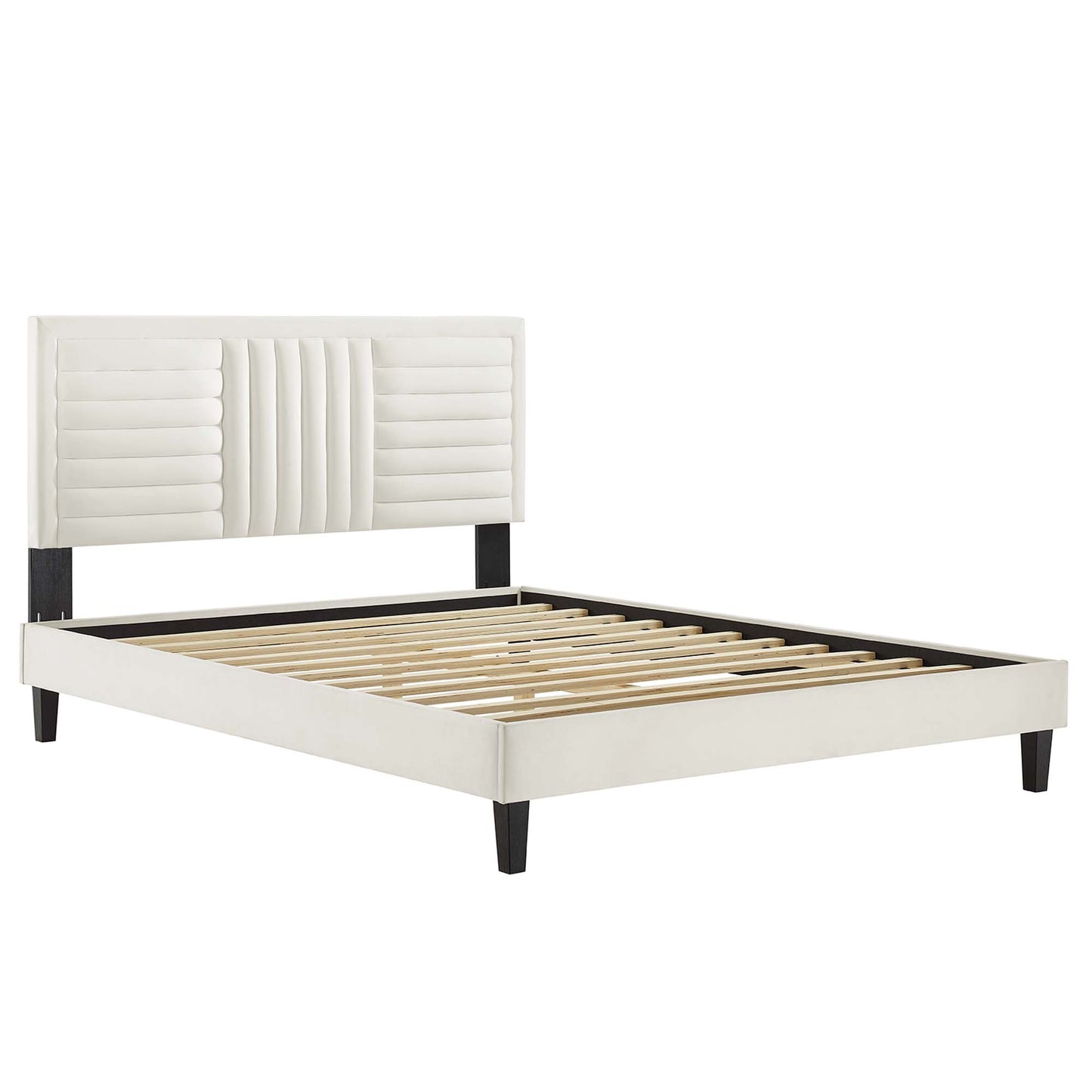 White upholstered platform bed with tufted headboard panels, black legs, and slatted wooden base.
