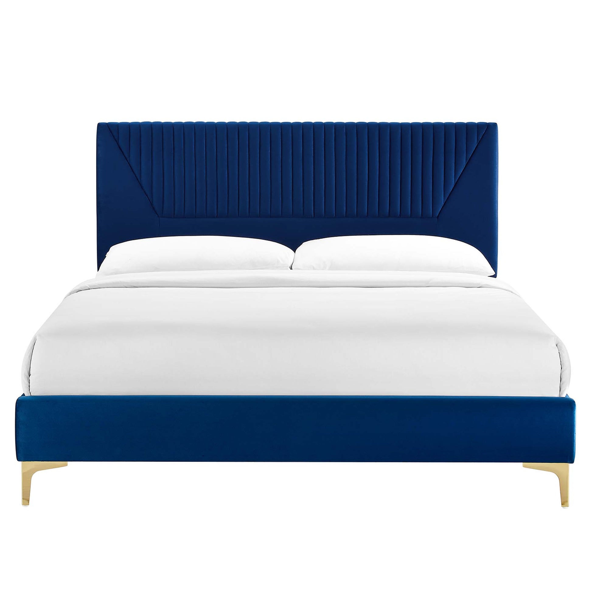 Navy velvet twin platform bed with a tall channel-tufted headboard and gold legs, white bedding.