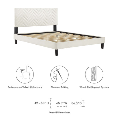 White velvet upholstered twin platform bed with chevron-tufted headboard, wood slat support, and tapered black legs.