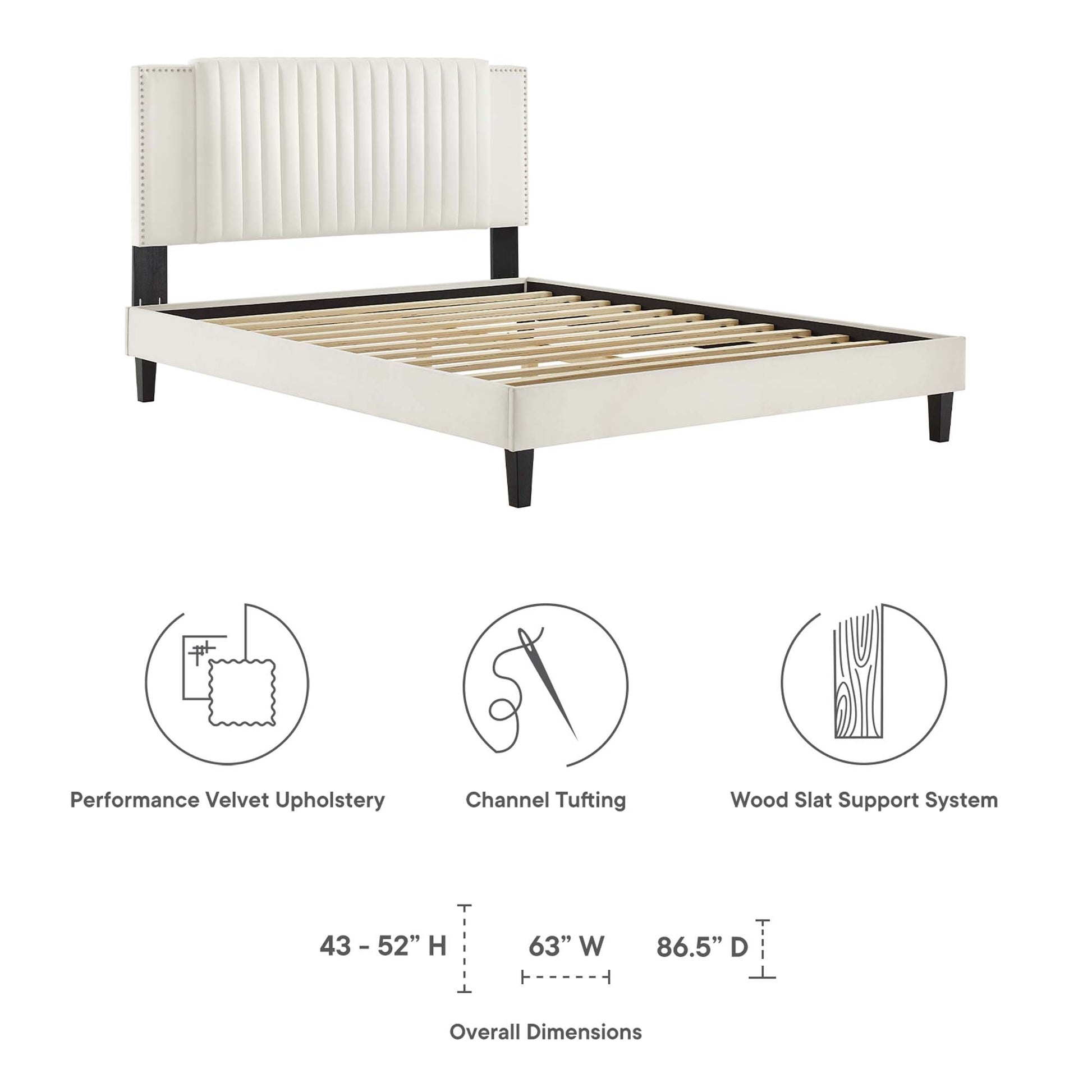 White twin platform bed with tall channel-tufted headboard, white rails, black tapered legs, and wood slat support.