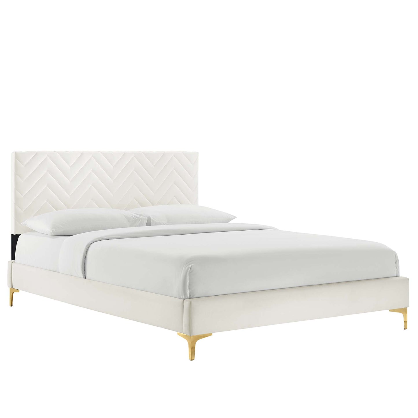 White upholstered bed with chevron-tufted headboard, cream frame and gold-finish legs.