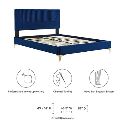 Navy velvet upholstered full platform bed with gold legs, channel-tufted headboard, wood slat support, modern luxury style.