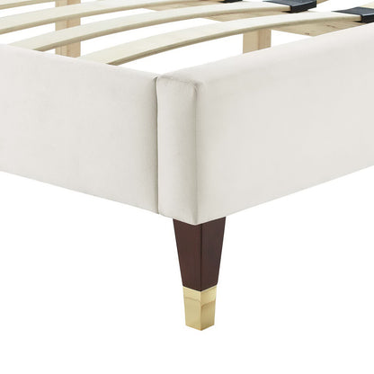 White performance velvet full platform bed with channel tufting; slatted base visible.