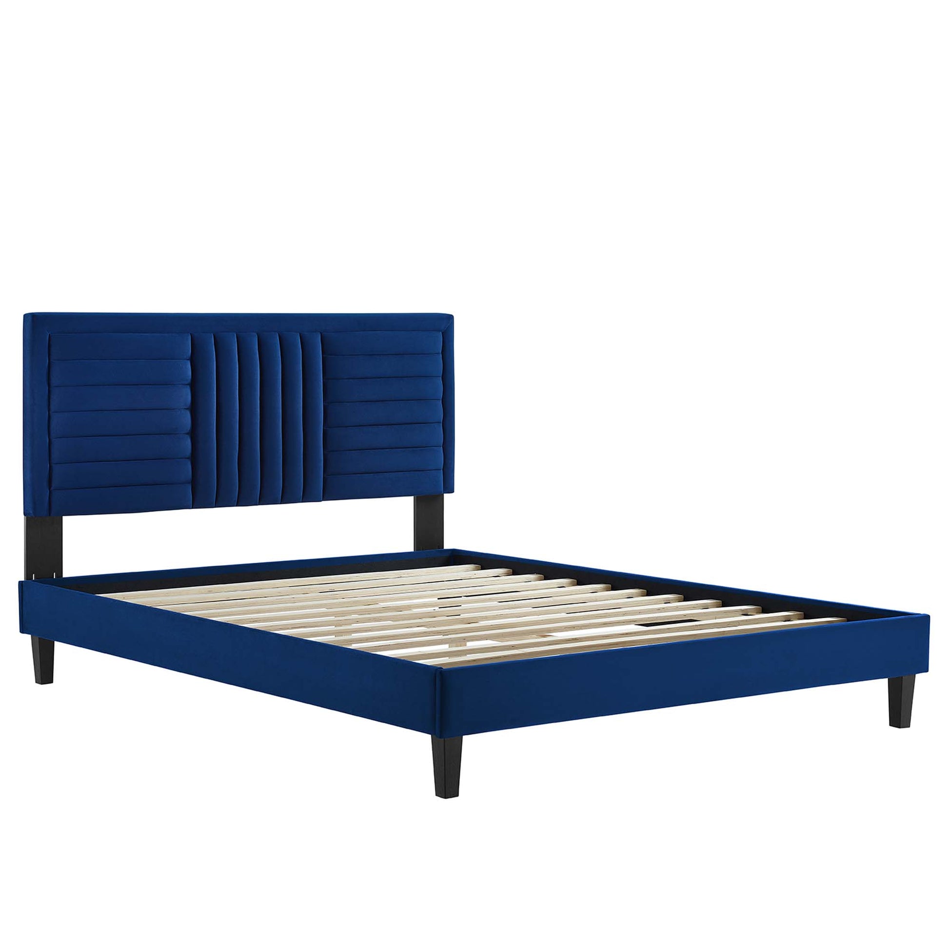 Navy blue upholstered full platform bed with padded vertical-channel headboard, wooden slat base, and black tapered legs