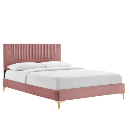 Dusty-rose velvet upholstered platform bed with vertical tufted headboard, gold legs, and white bedding.