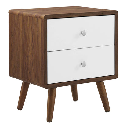 Mid-century nightstand with white drawer fronts, two drawers, round silver knobs, and tapered legs.