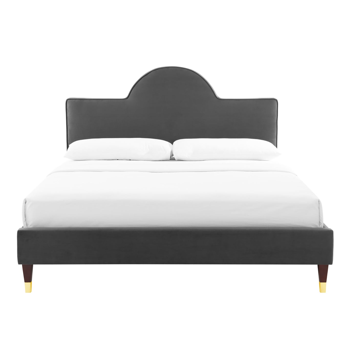 Charcoal gray upholstered bed with arched headboard, low platform frame, wooden tapered legs with gold tips.