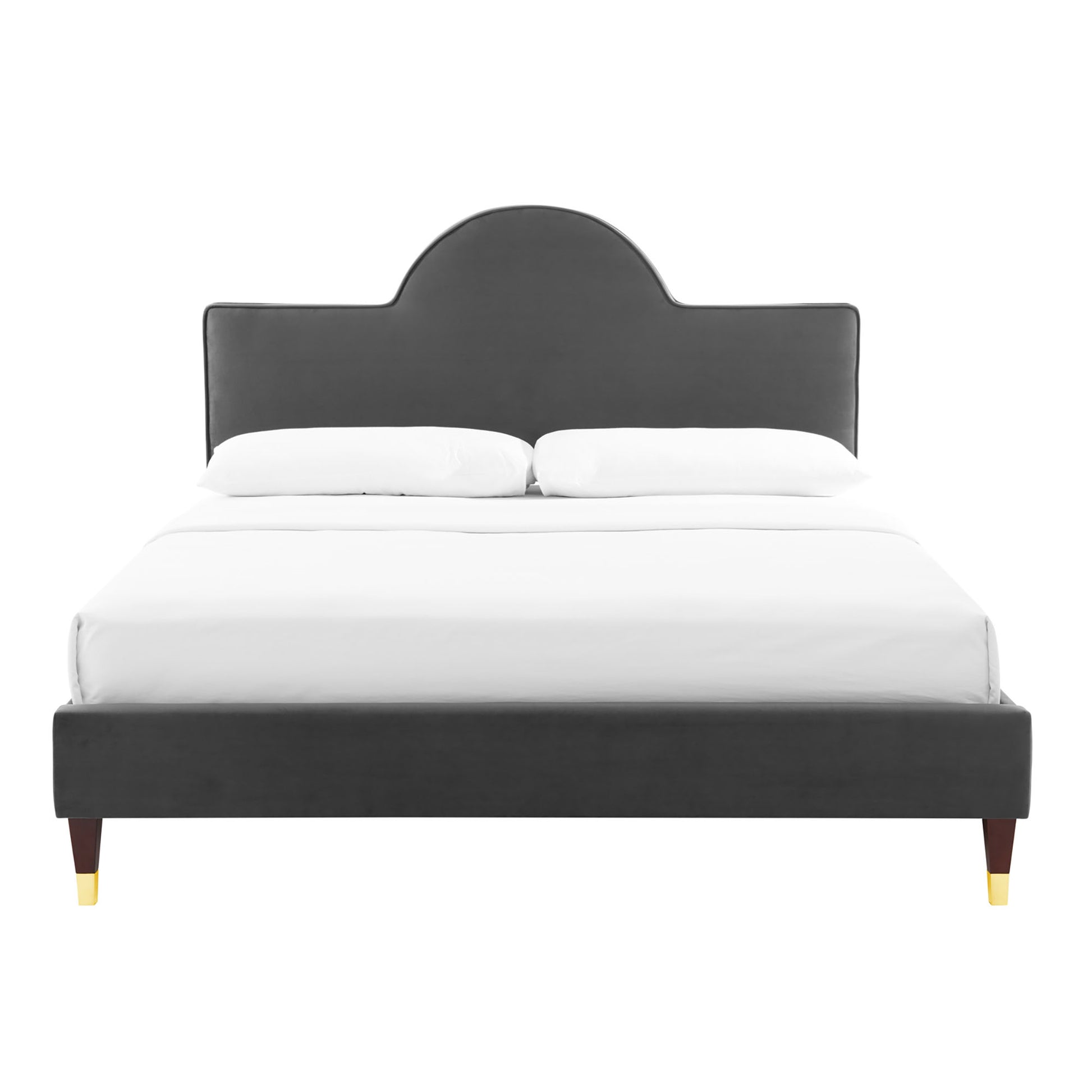 Charcoal gray upholstered bed with arched headboard, low platform frame, wooden tapered legs with gold tips.