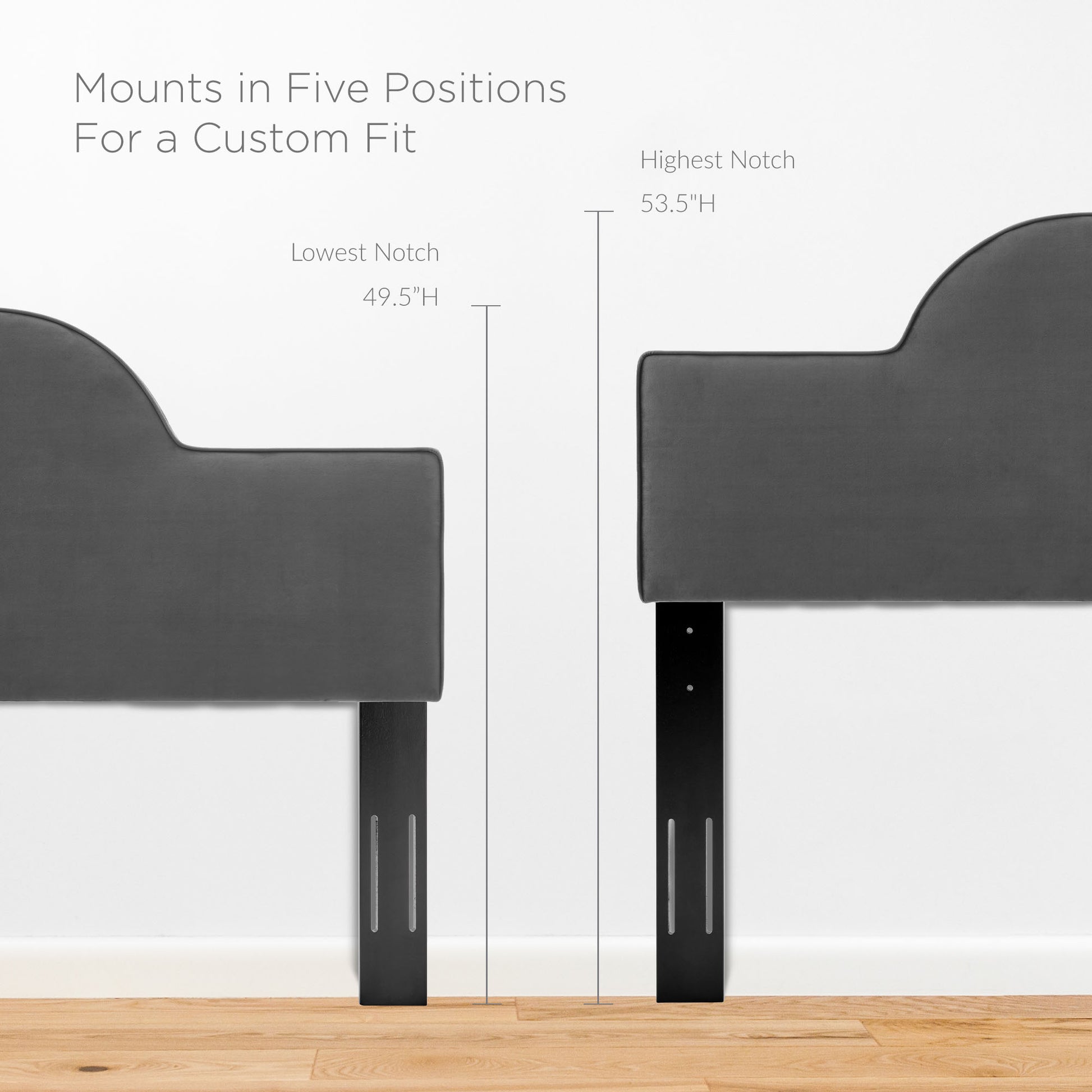Two dark gray upholstered bed ends with curved tops on black adjustable legs, height options 49.5–53.5 inches.