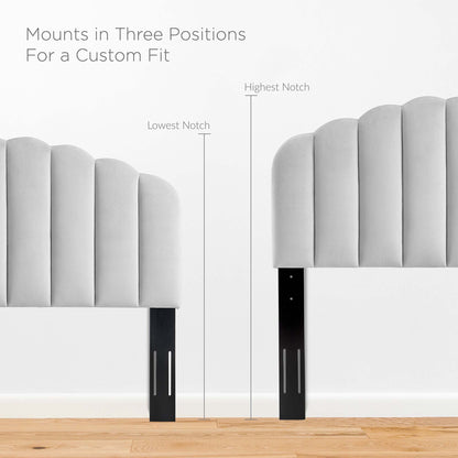Grey upholstered headboard with vertical channel tufting, black metal legs, three-position mounts for a custom fit.