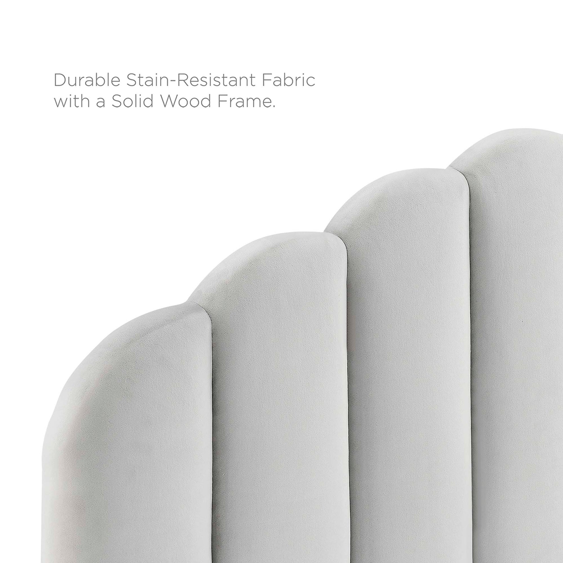 Light gray, stain-resistant fabric on a full platform bed with a solid wood frame.