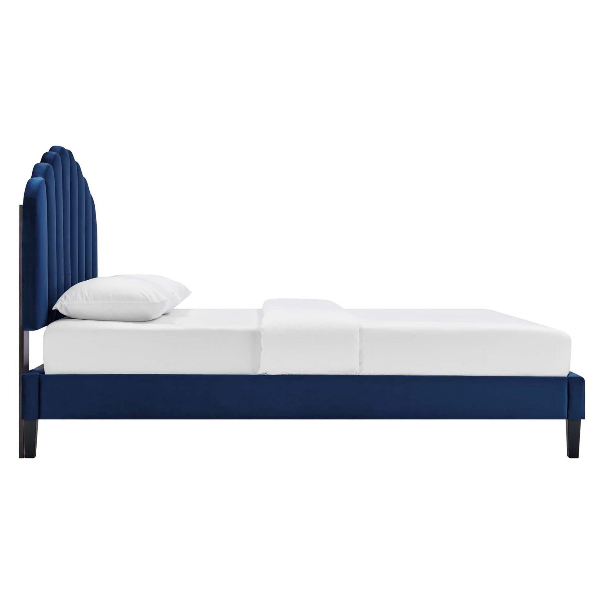 Navy blue upholstered platform bed with a curved sunburst headboard and white mattress set.