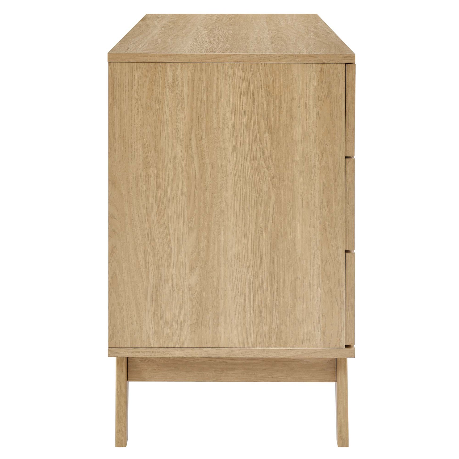 Light oak mid-century style six-drawer dresser on tapered legs.