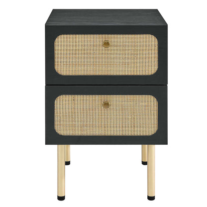 Black two-drawer nightstand with natural cane fronts, brass knobs and gold legs.