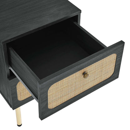 Charcoal black wood nightstand with a caned drawer front, brass knob, partially open drawer, tapered legs.