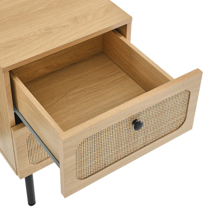 Light oak 2-drawer nightstand with woven cane drawer fronts, black knobs, a partially open drawer on metal slides, and tapered black legs.