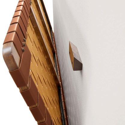 Brown walnut-toned twin wall-mount headboard with a woven vegan-leather panel