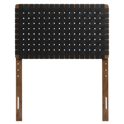 Walnut wood-framed twin headboard with a black woven vegan-leather panel.