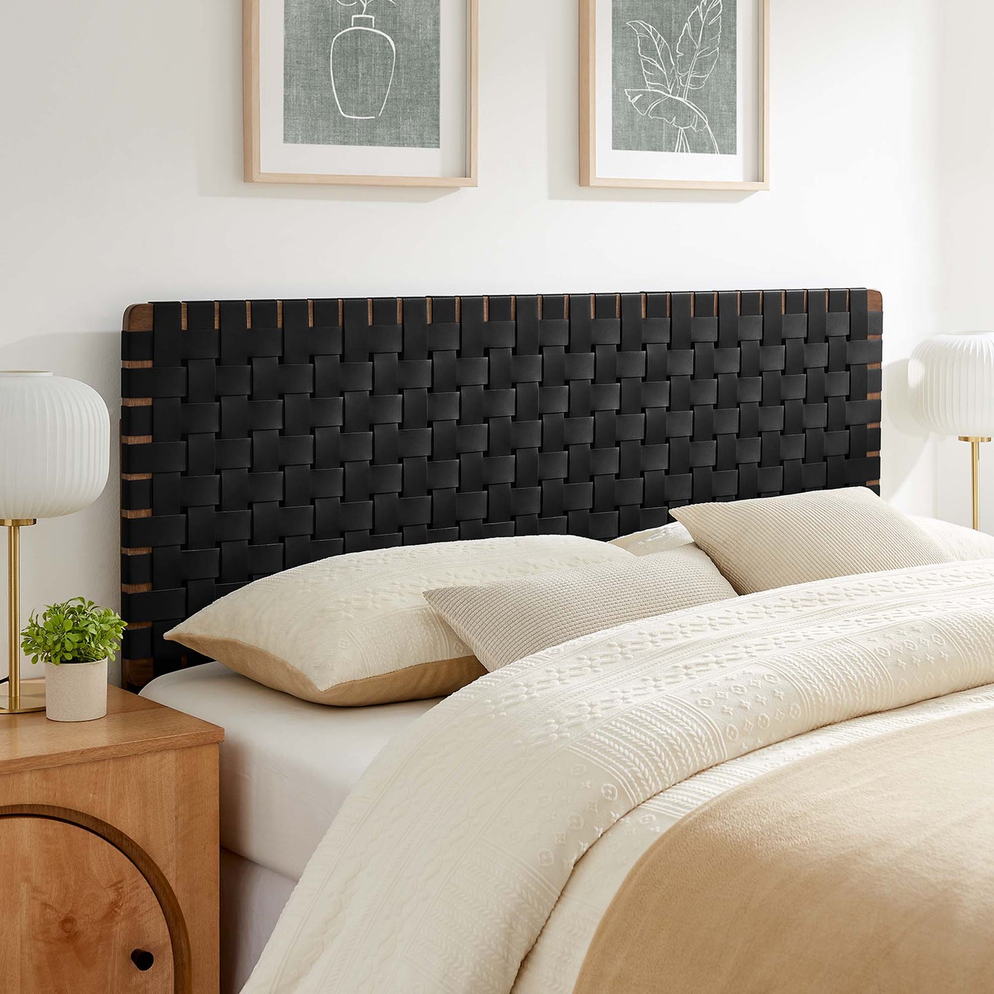 Queen headboard with black weave vegan leather and a light wood frame.
