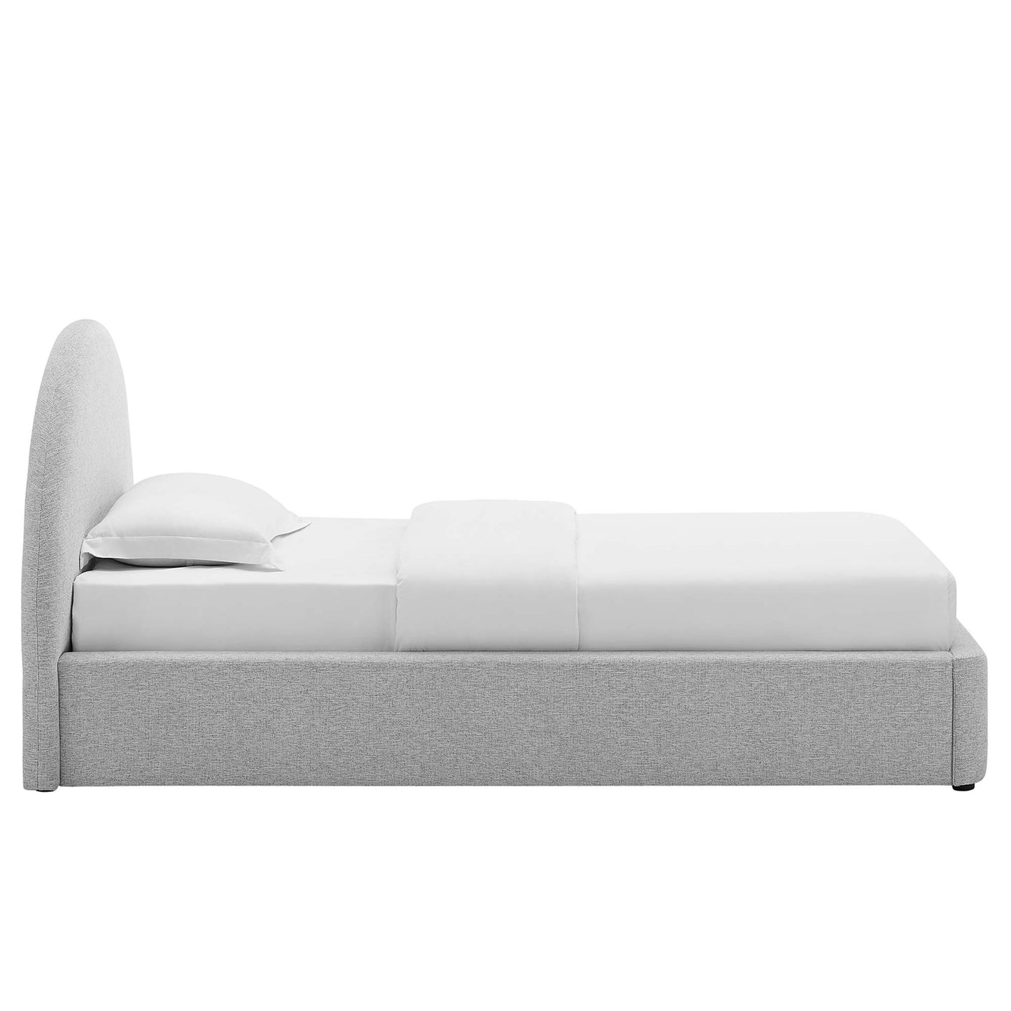 Light gray upholstered platform bed with a tall curved headboard and white linens.