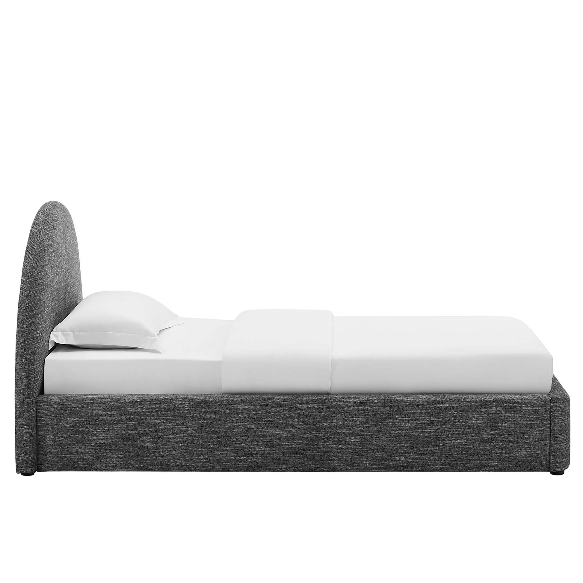 Grey textured fabric platform bed with curved tall headboard and white bedding.