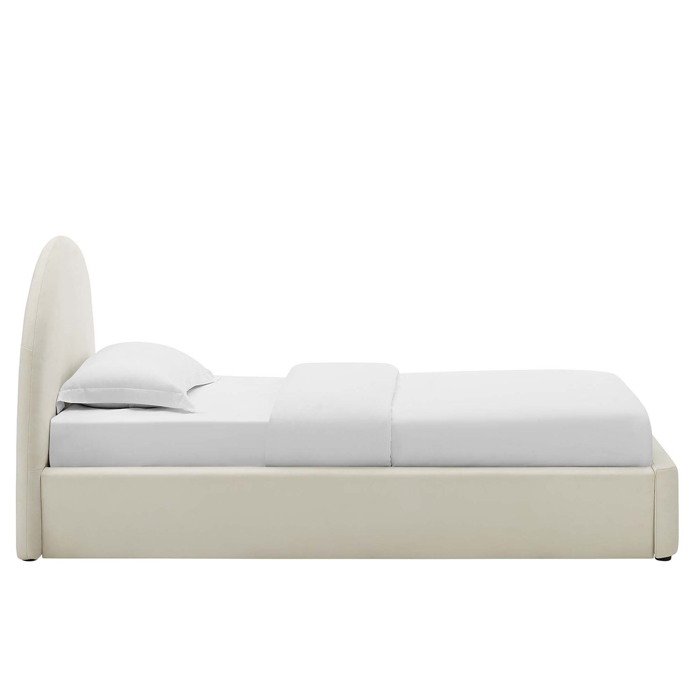 White velvet upholstered platform bed with an arched headboard and white bedding; contemporary minimalist design.