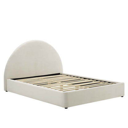 Cream upholstered bed frame with arched headboard and wooden slats, minimalist modern bedroom style.