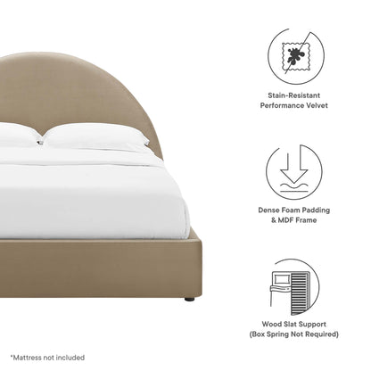 Taupe upholstered bed with curved headboard and white bedding; stain-resistant velvet, foam padding & MDF frame, wood slats.