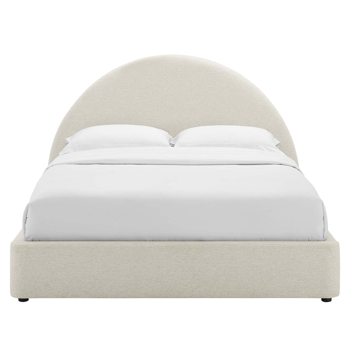 White upholstered platform bed with a tall rounded-arch headboard and white bedding.