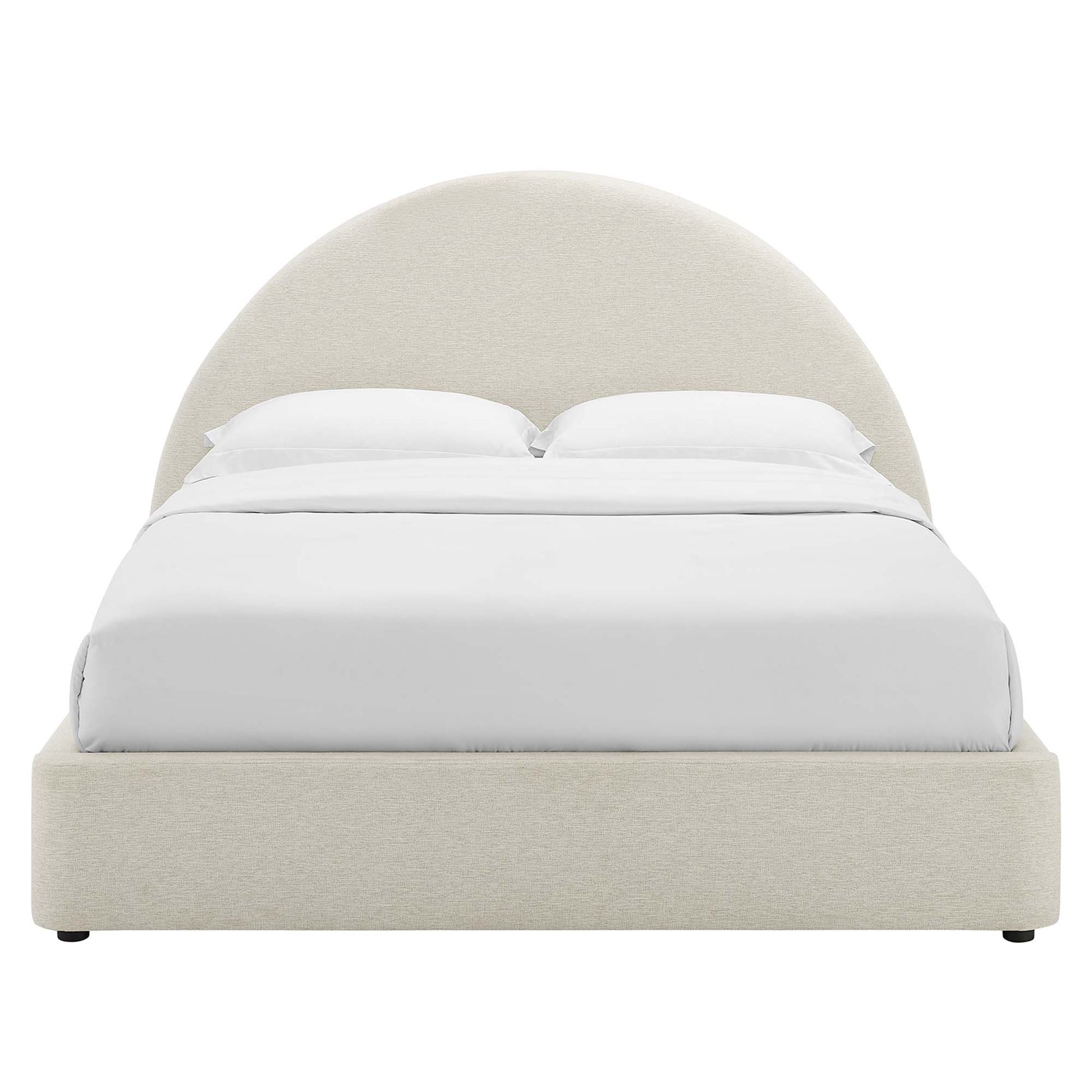 White upholstered platform bed with a tall rounded-arch headboard and white bedding.