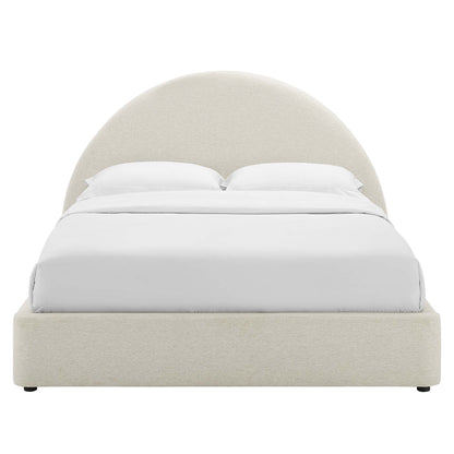 White upholstered platform bed with a tall rounded-arch headboard and white bedding.