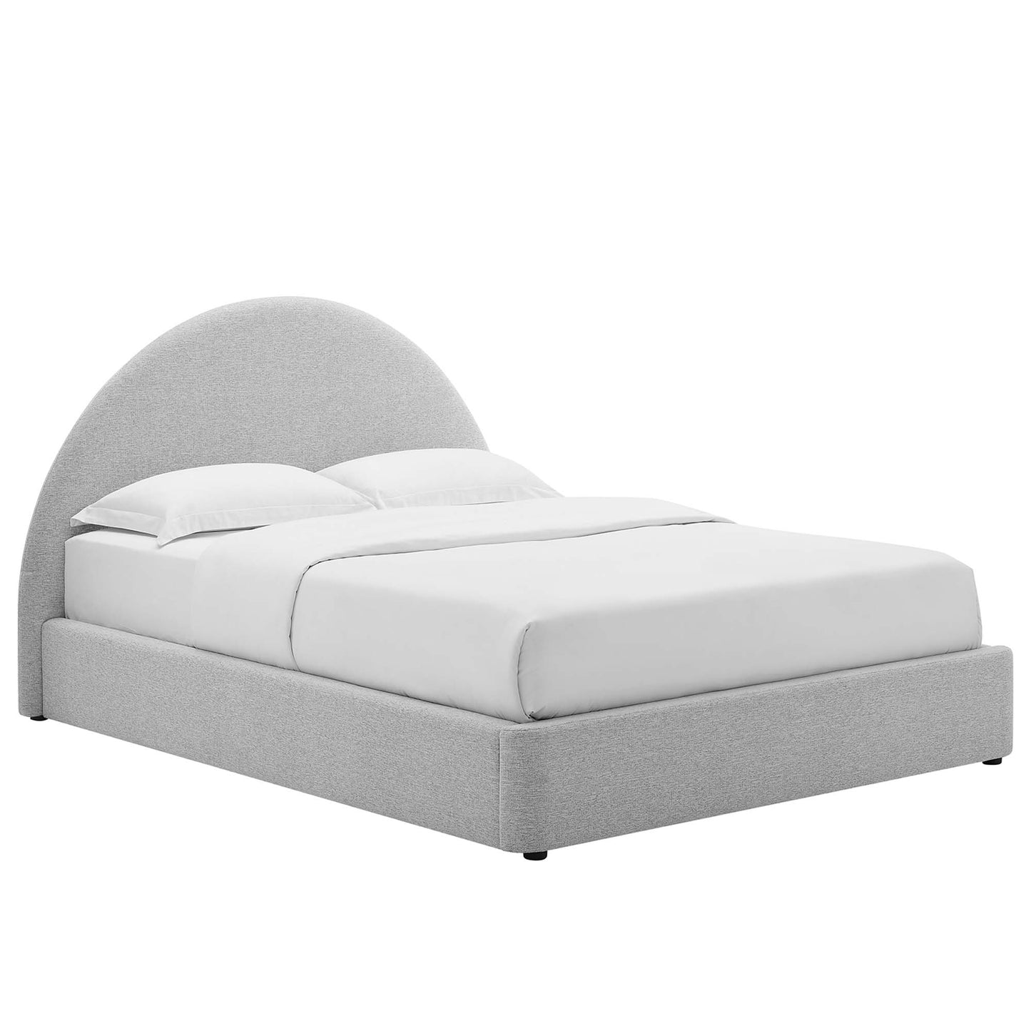 Gray fabric upholstered queen platform bed with an arched round headboard & white linens.