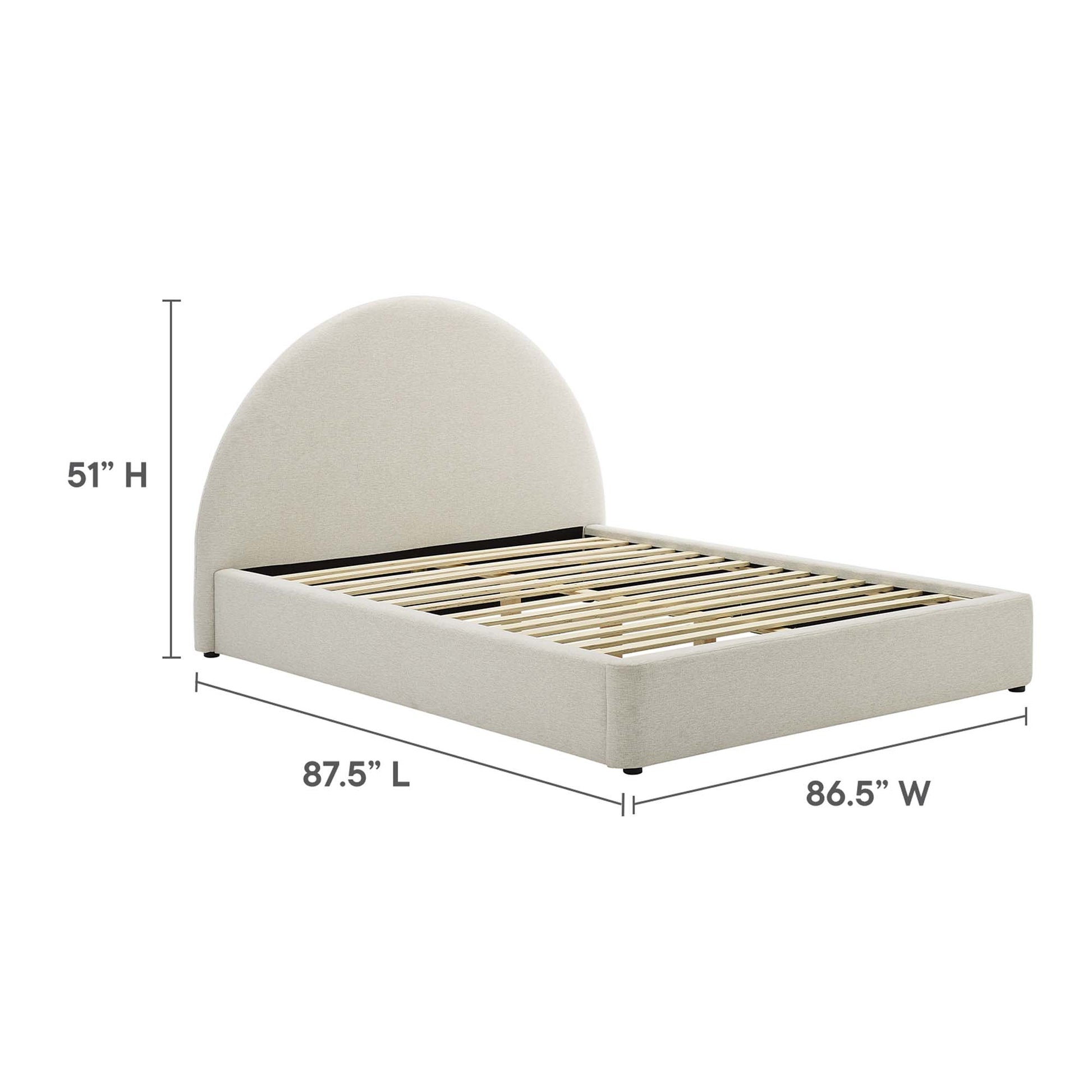 White fabric upholstered king platform bed with rounded arch headboard and wooden slat base.