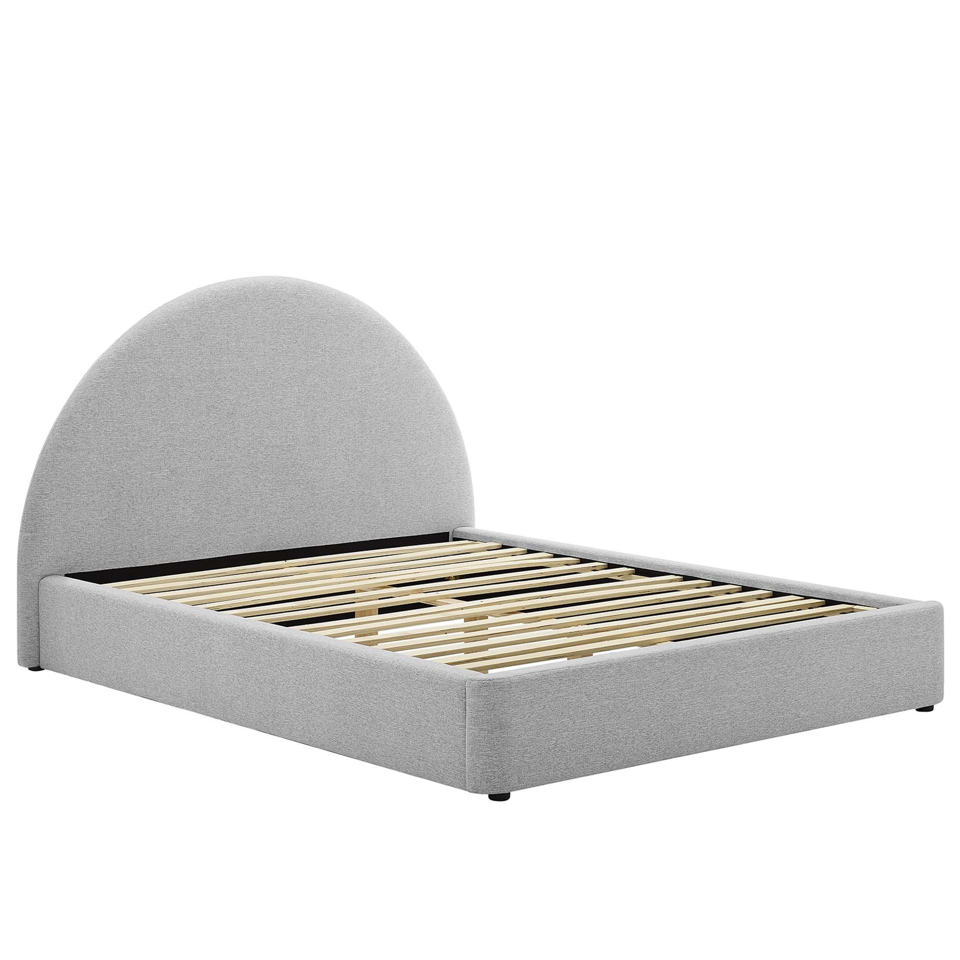 Light gray upholstered platform bed with rounded arch headboard and wooden slat base.