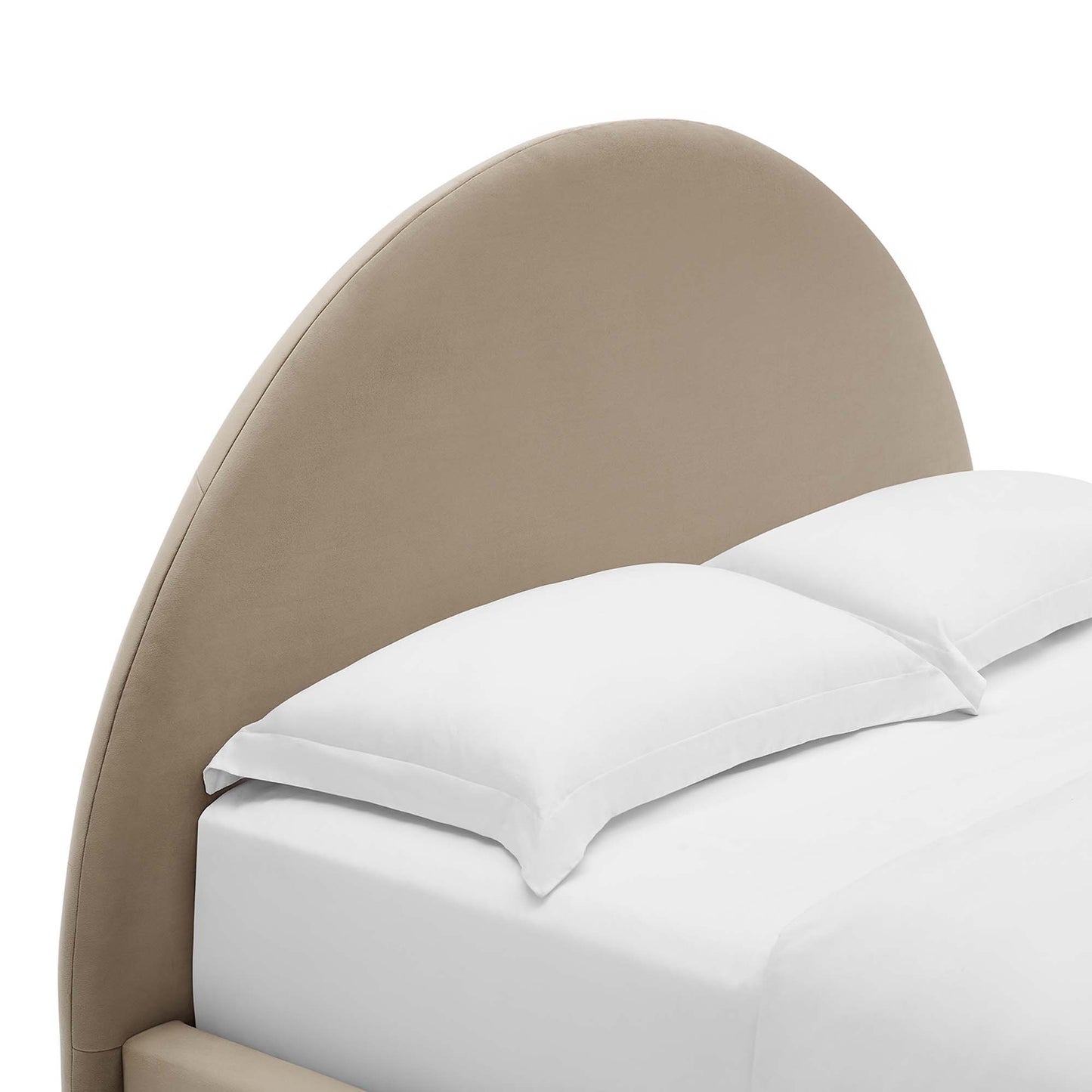Taupe curved upholstered headboard with white bedding and pillows on a bed.