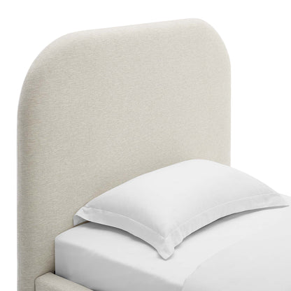 Beige upholstered curved twin platform bed with white bedding in a contemporary bedroom.