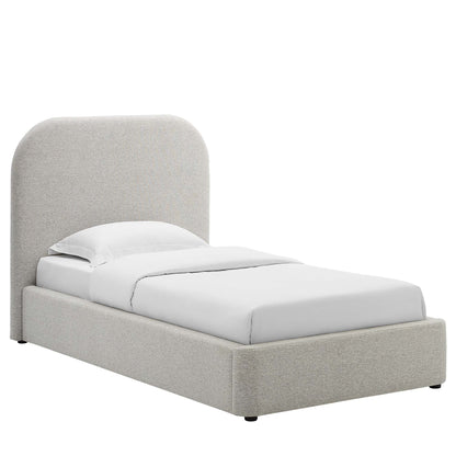 Light gray upholstered platform bed with a tall rounded headboard and white bedding.